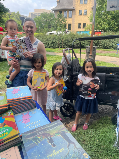 Photo of Ohio family with books at ROTW event