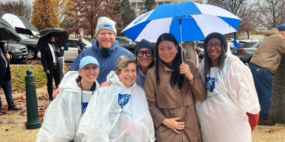 AFT president Randi Weingarten with members. During the rally she urged the crowd to keep fighting.