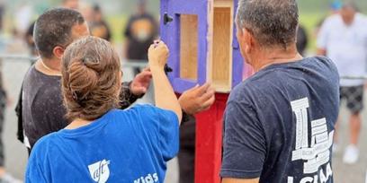 As a community service, AFT members helped erect and stock Little Free Libraries.