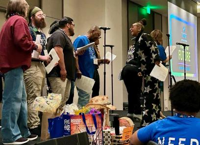 “Motown Diva” Lynn Marie Smith, at right, leads the PSRP Solidarity Chorus.