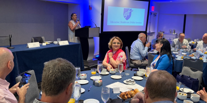 International guests gather for a welcome breakfast.