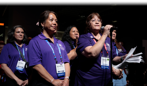 Teri Carvalho, President of Hawaii Nurses and Healthcare Professionals (HNHP) speaks at AFT's 2026 Convention with support from HNHP delegates.